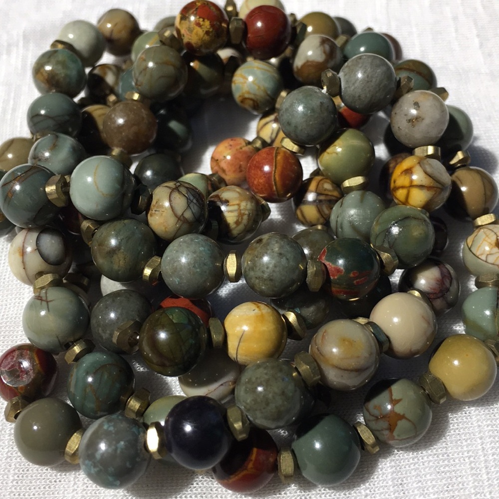 Painted jasper pearls with brass beads. Picasso